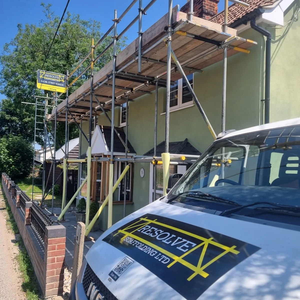 Resolve Scaffolding van beside a scaffolded home in Haverhill